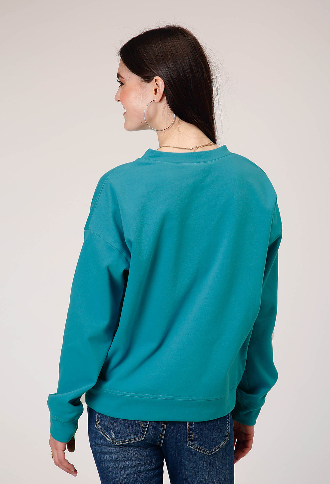 WOMENS LONG SLEEVE COTTON FLEECE CREW NECK TOP WITH MATCHING POLY FRINGE CENTER FRONT