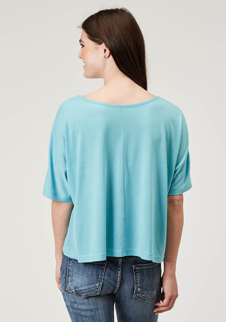 WOMENS SHORT SLEEVE LIGHT BLUE POLY RAYON CROP SWING TEE WITH OVERSIZED FIT DOLMAN SLEEVE SCREEN PRINT