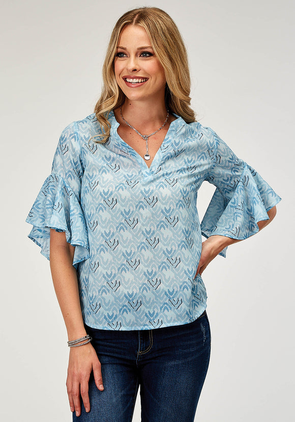 WOMENS SHORT SLEEVE PULLOVER IKAT CHEVERON PRINT POLY BLOUSE WITH V NECK PLACKET AND CIRCULAR RUFFLE CUFFS